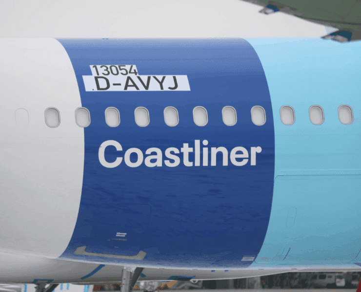 the side of a plane with a blue stripe