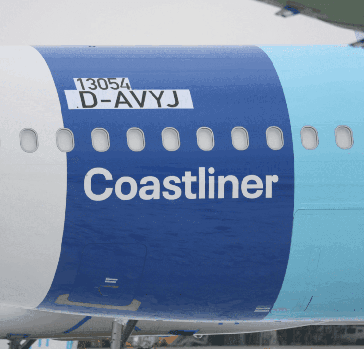 the side of a plane with a blue stripe