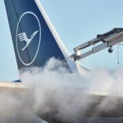 a jet plane with smoke coming out of it