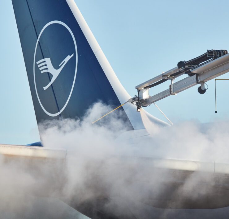 a jet plane with smoke coming out of it