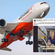 a plane with a person in the background