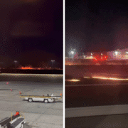 a plane on the runway at night