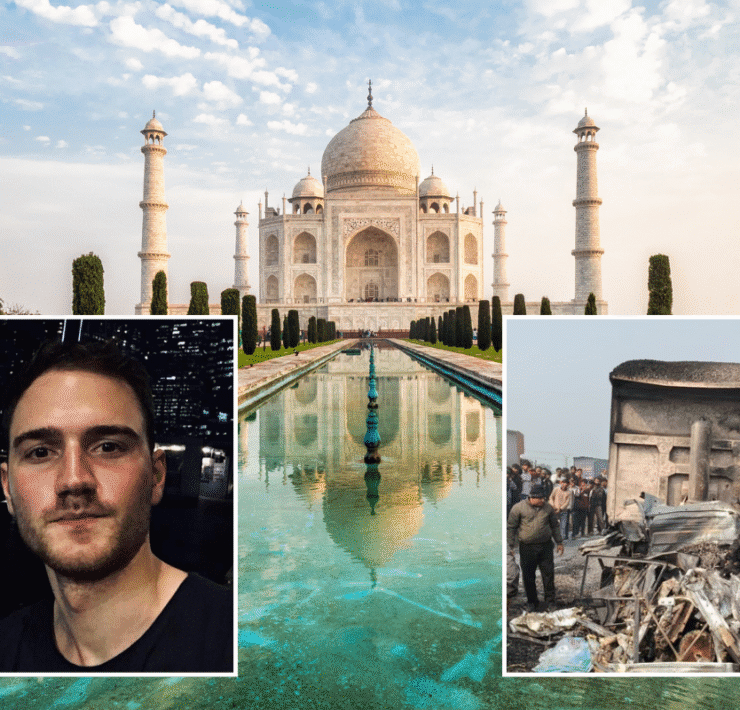 a man taking a selfie in front of Taj Mahal