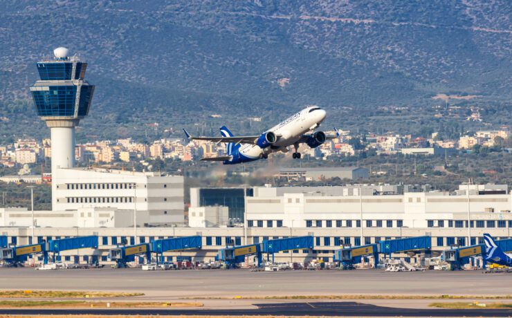 a plane taking off from athens airport