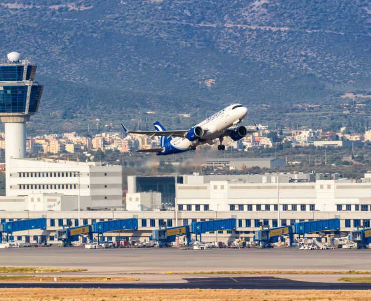a plane taking off from athens airport
