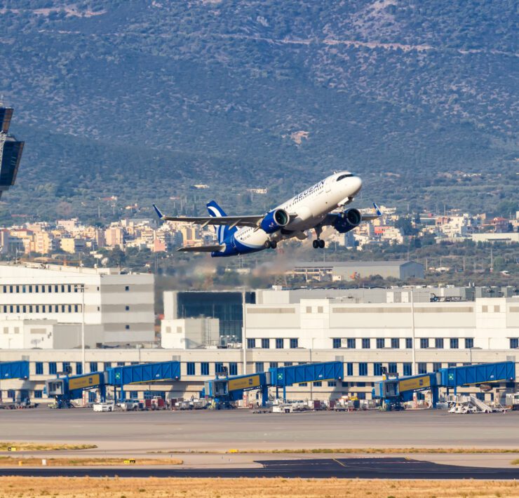 a plane taking off from athens airport