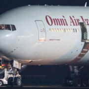 an omni air international boeing 767 on the tarmac