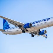a united airlines boeing 737 flying in the sky