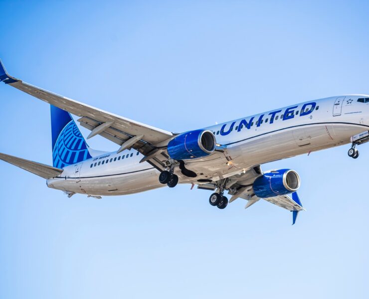 a united airlines boeing 737 flying in the sky