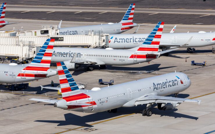airplanes parked on a runway