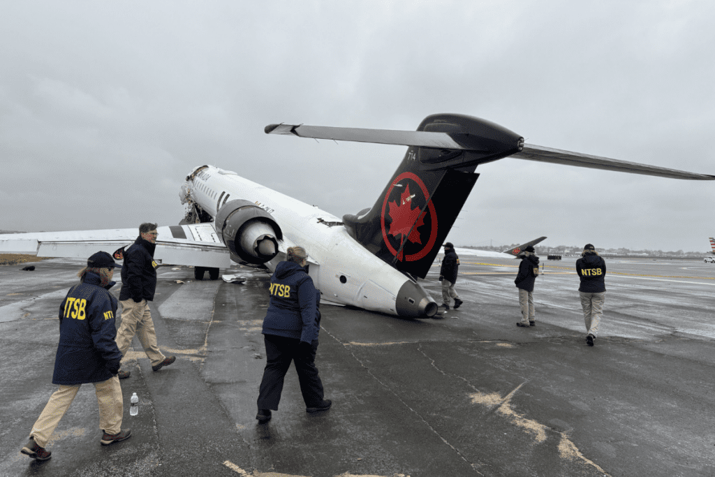 NTSB walk the scenes of crash of Air Canada Express regional jet at LaGuardia Airport