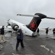 NTSB walk the scenes of crash of Air Canada Express regional jet at LaGuardia Airport