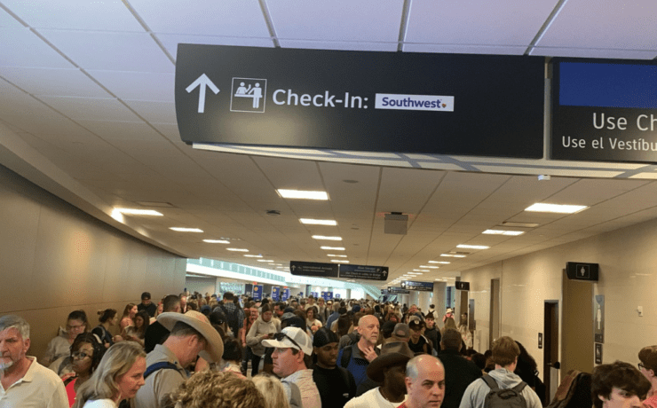 a group of people in a hallway