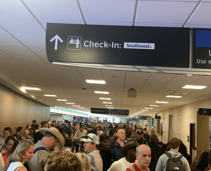 a group of people in a hallway
