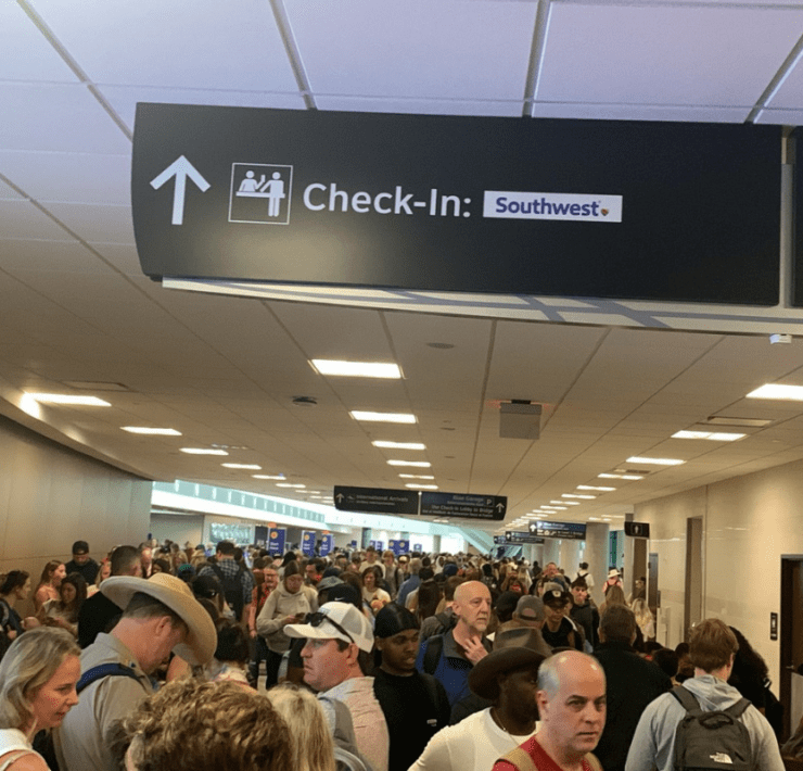a group of people in a hallway