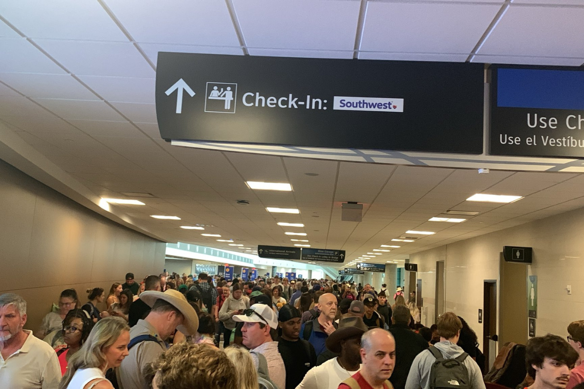 a group of people in a hallway