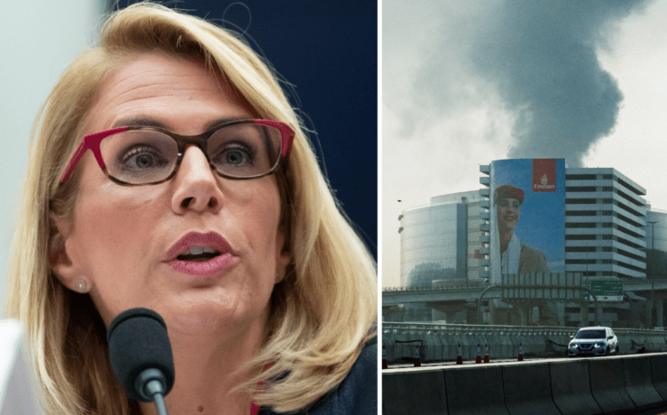 a woman speaking into a microphone