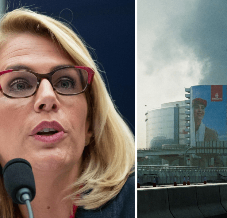 a woman speaking into a microphone