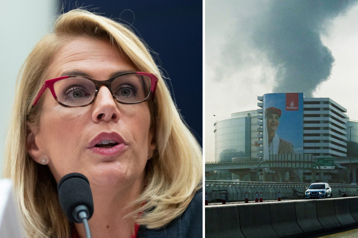 a woman speaking into a microphone