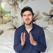 a man sitting on a bed