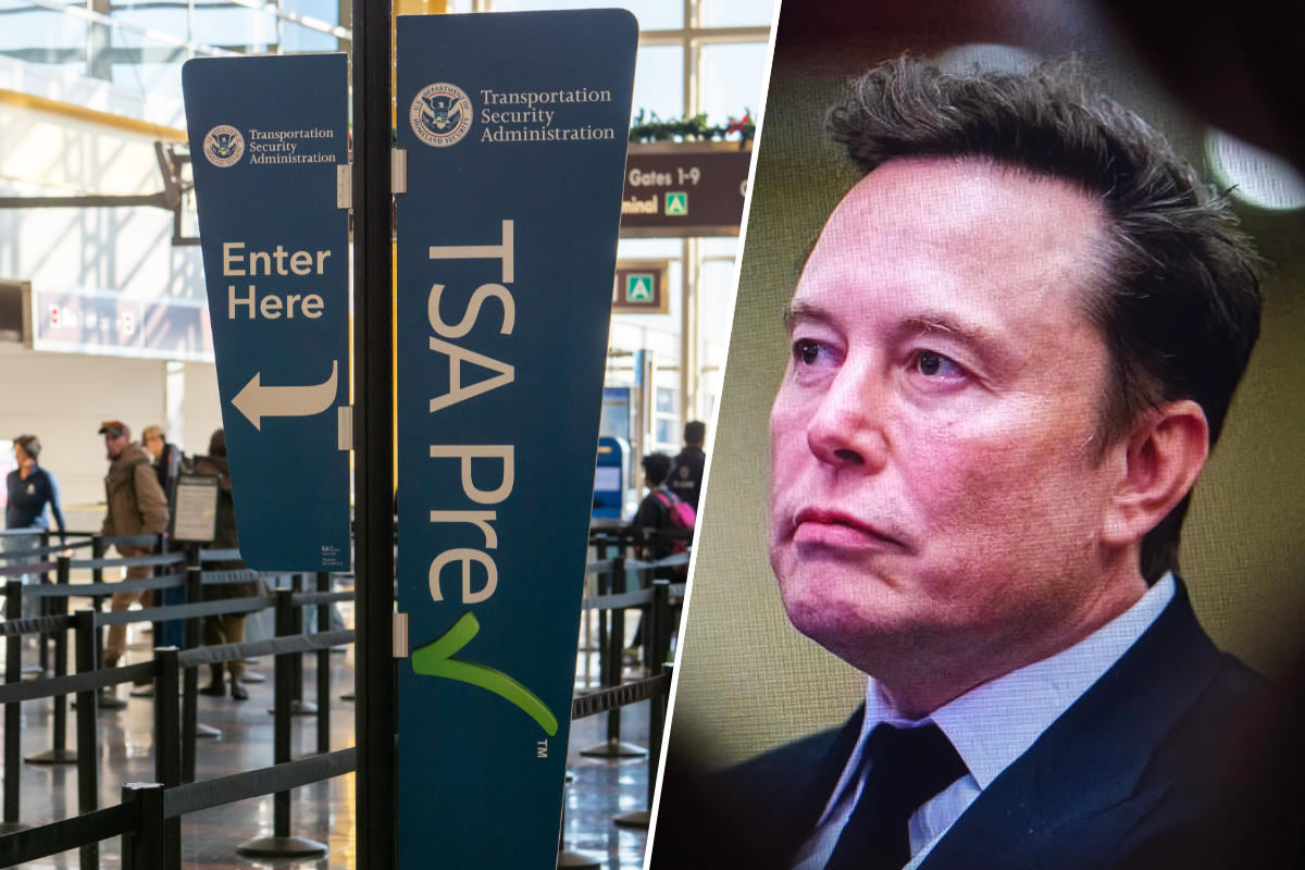 a man in a suit and tie next to a sign