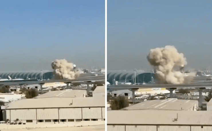 a cloud of smoke coming out of a building
