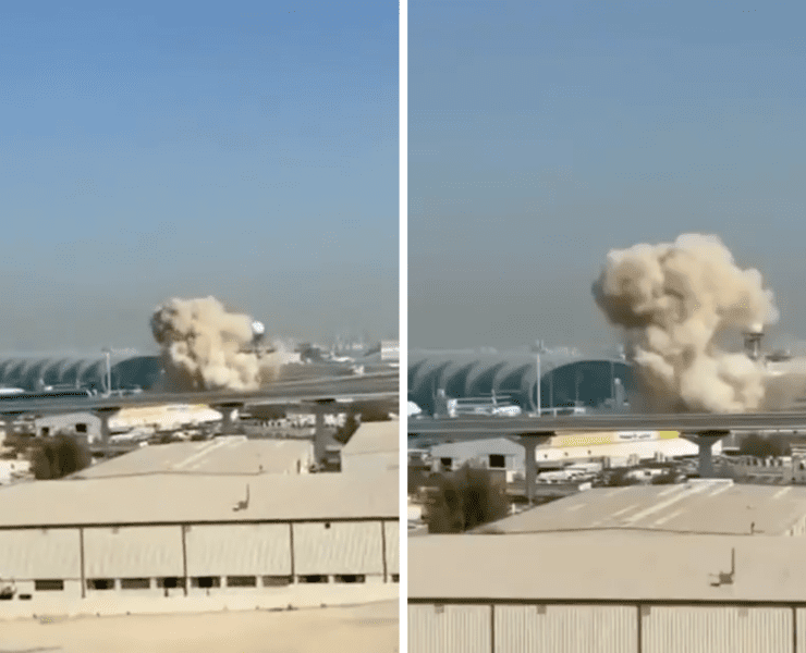 a cloud of smoke coming out of a building