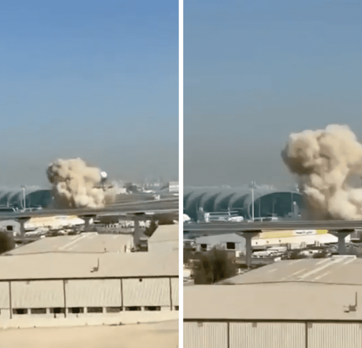 a cloud of smoke coming out of a building