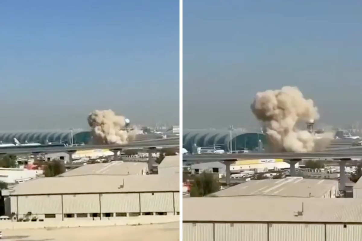 a cloud of smoke coming out of a building