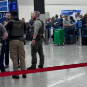 a group of people in a airport