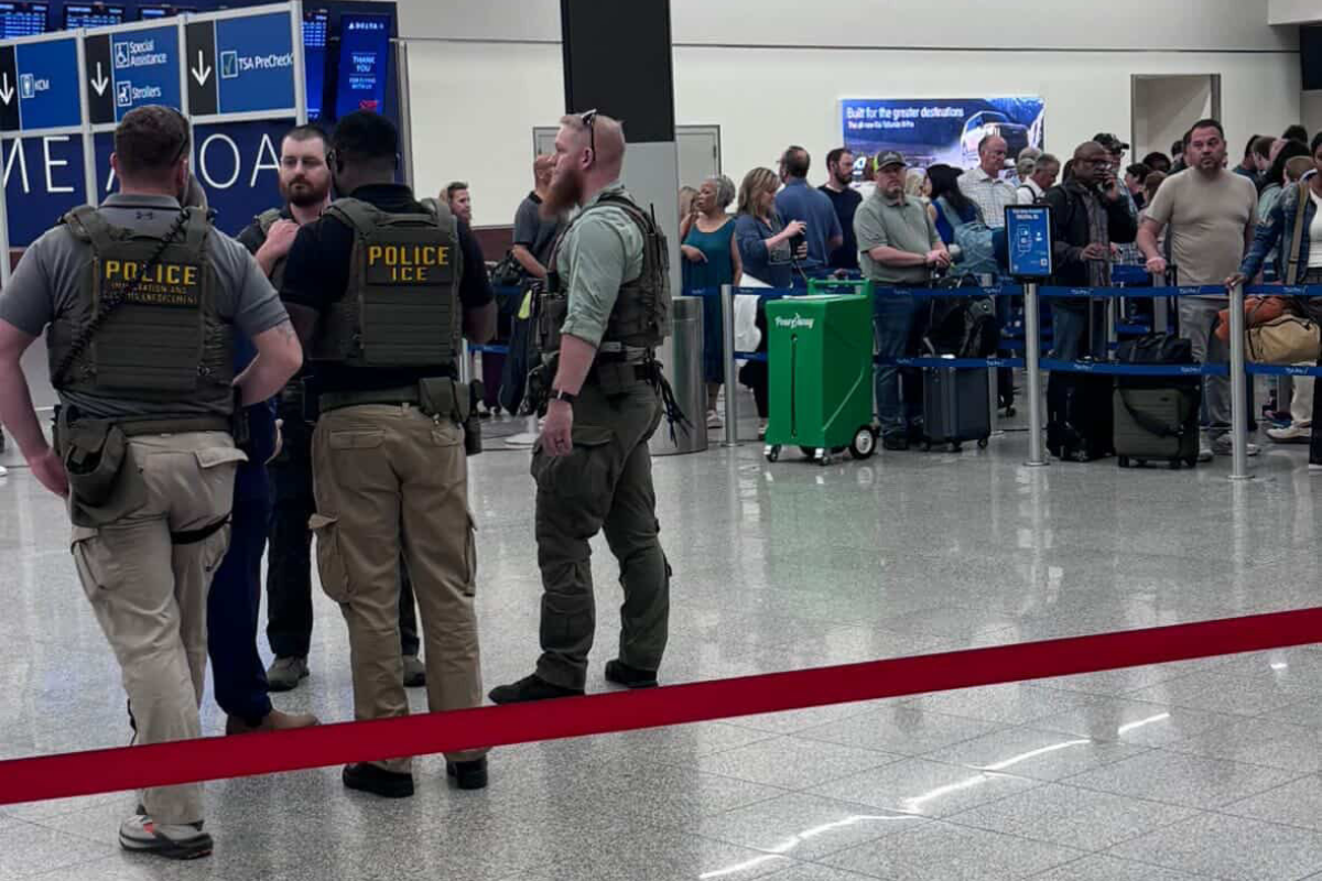 a group of people in a airport