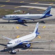 two Indigo Airlines airplanes on the tarmac at Mumbai Airport