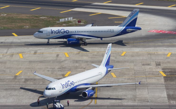 two Indigo Airlines airplanes on the tarmac at Mumbai Airport