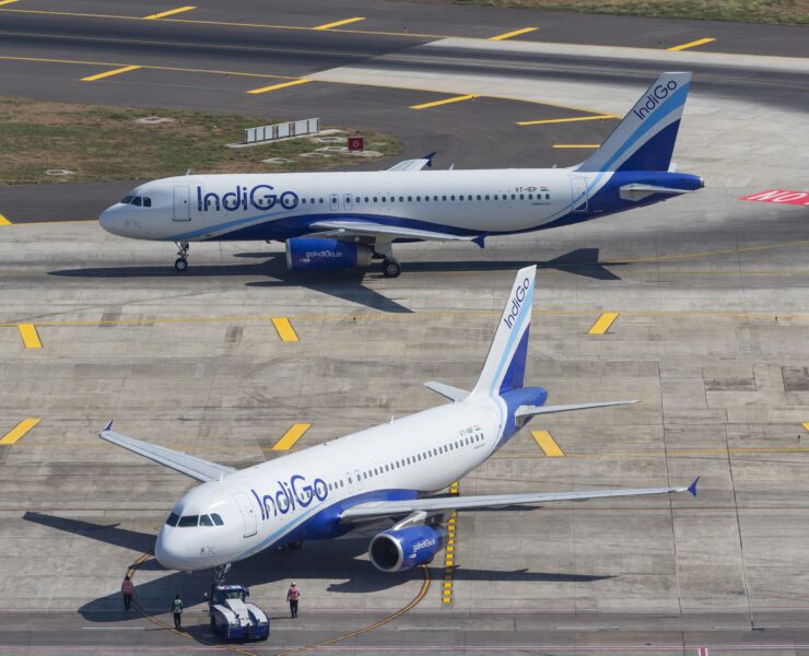 two Indigo Airlines airplanes on the tarmac at Mumbai Airport