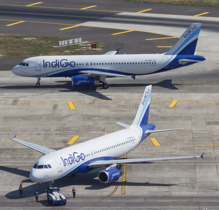 two Indigo Airlines airplanes on the tarmac at Mumbai Airport