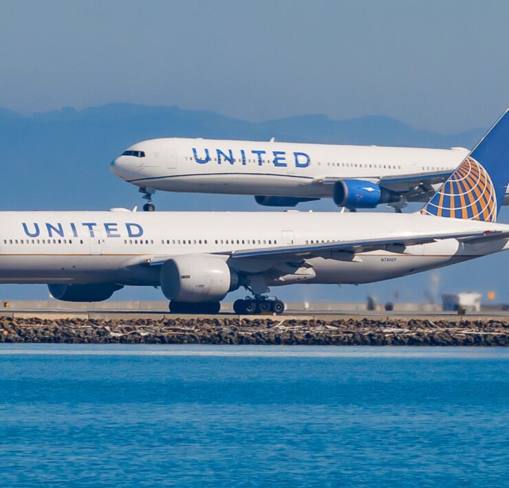 two united airlines planes coming into land at SFO