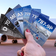 someone holding up a deck of american airlines trading cards