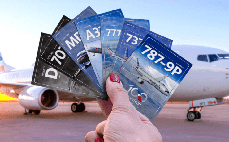 someone holding up a deck of american airlines trading cards