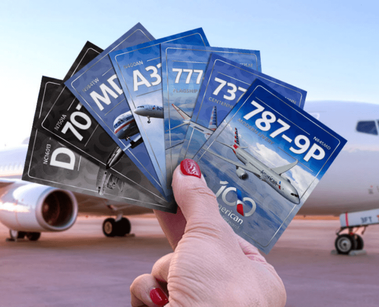 someone holding up a deck of american airlines trading cards