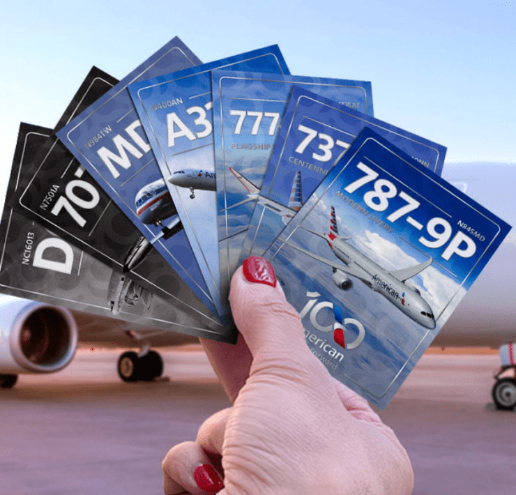 someone holding up a deck of american airlines trading cards