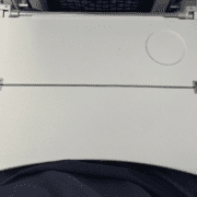 a closr up of a tray table on a united airlines plane