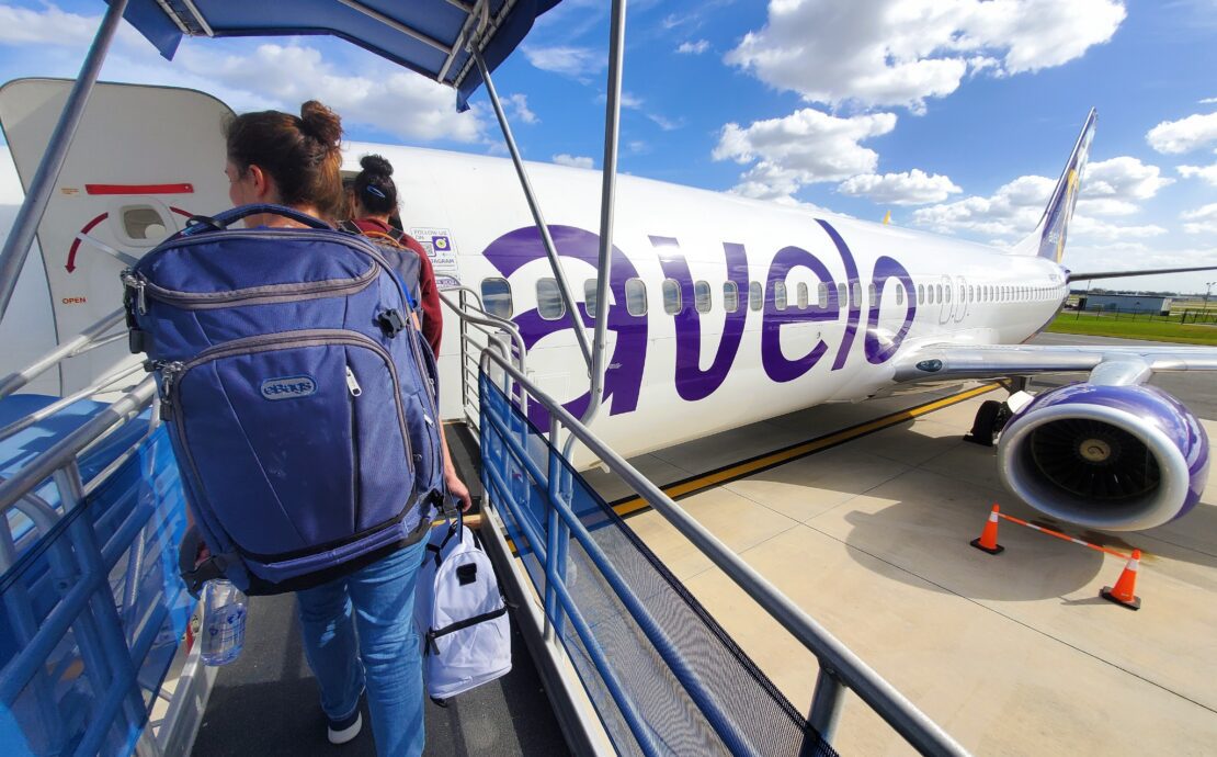 passengers boarding an avelo airlines plane