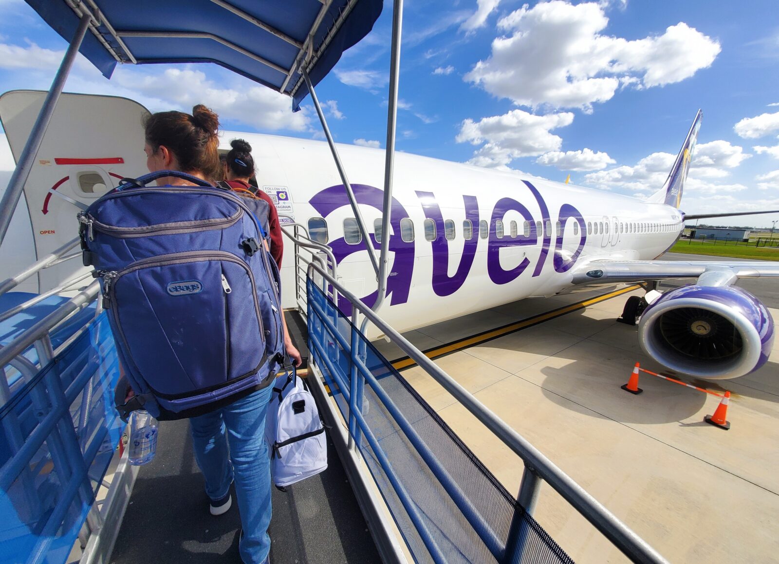 passengers boarding an avelo airlines plane
