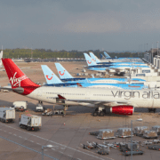 planed lined up at gates at manchester airport