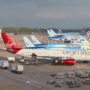 planed lined up at gates at manchester airport
