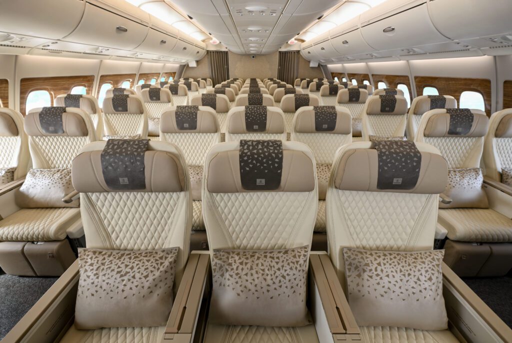 rows of premium economy seats on the upper deck of the Emirates a380