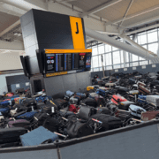 mountains luggage pile up in terminal 5 at heathrow airport