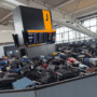 mountains luggage pile up in terminal 5 at heathrow airport