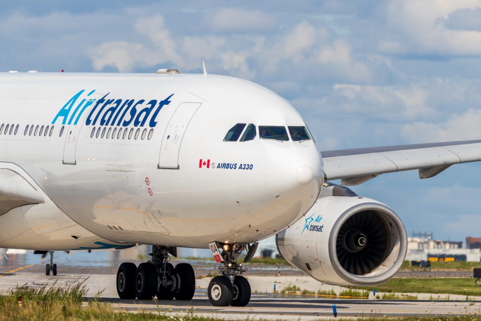 an Air Transat plane taxiing at Toronto Pearson Airport