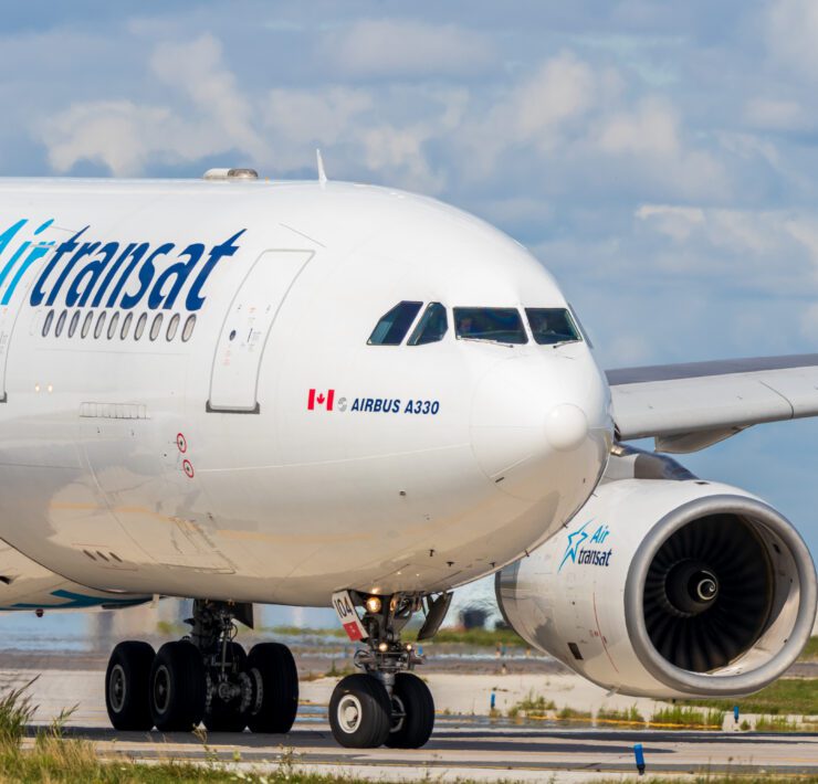 an Air Transat plane taxiing at Toronto Pearson Airport